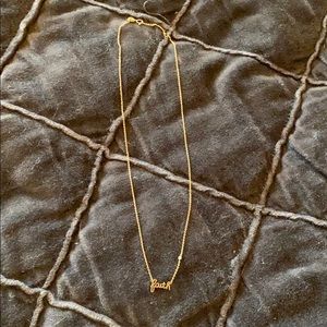 Gold “faith” necklace with diamond